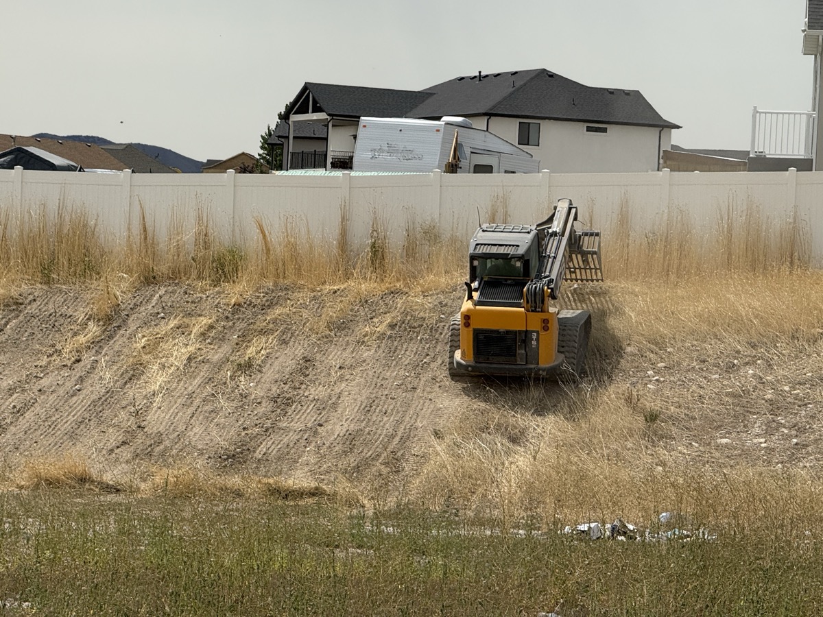 Brush clearing with skid steer