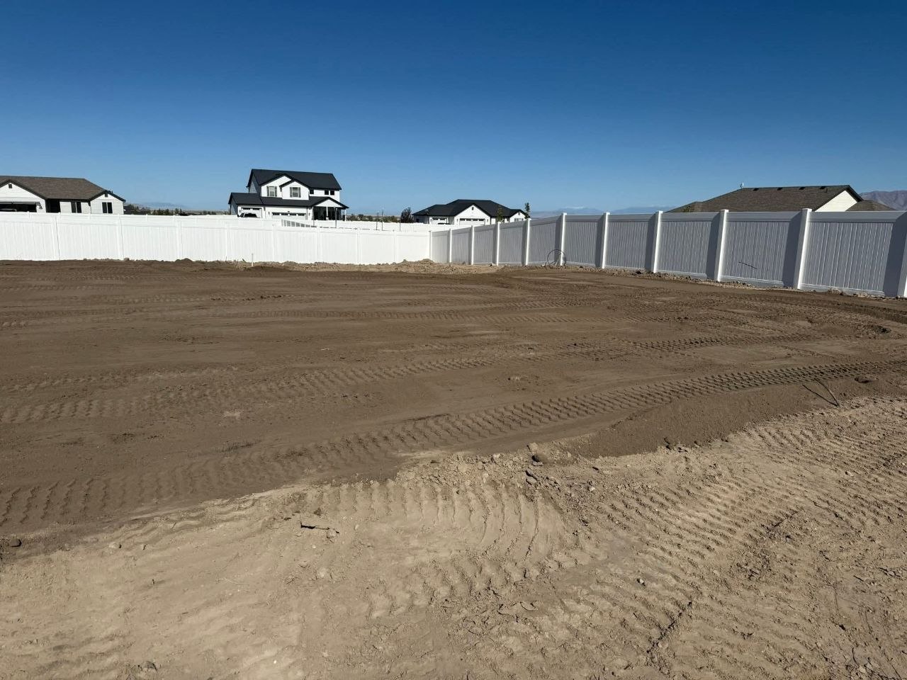 Freshly graded and leveled yard ready for landscaping