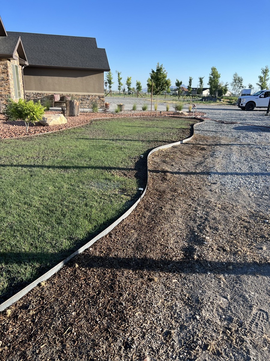 Lawn edging and grading in progress