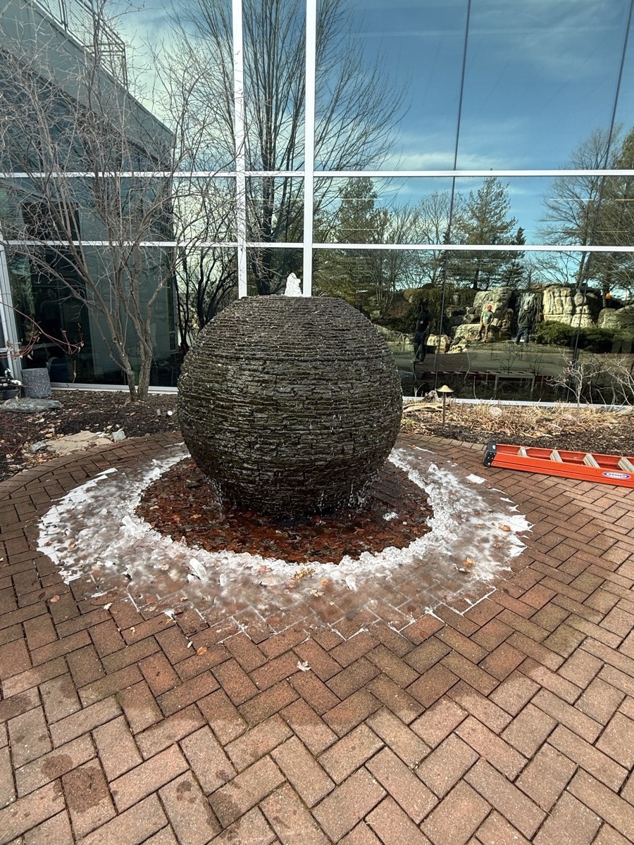 Sphere water feature installed outdoors