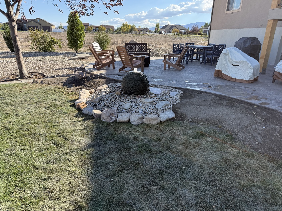 Completed sphere water feature, backyard patio