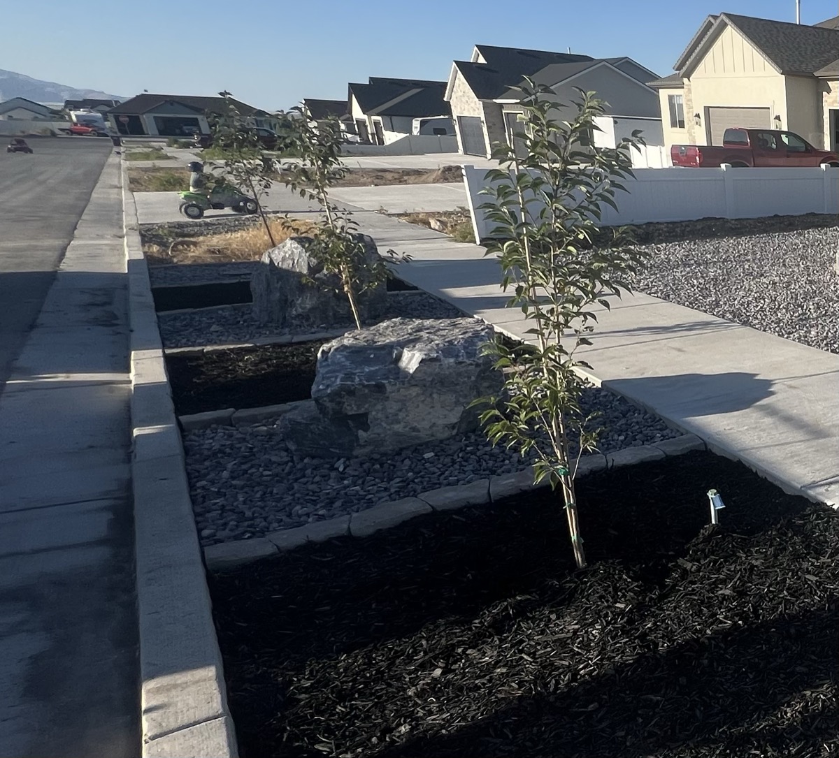 Xeriscape planter bed with decorative rock