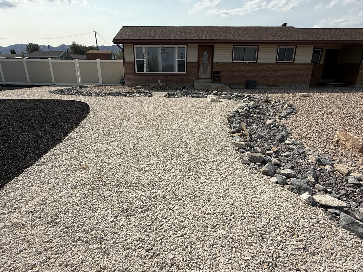 Full front yard xeriscape at ranch-style home